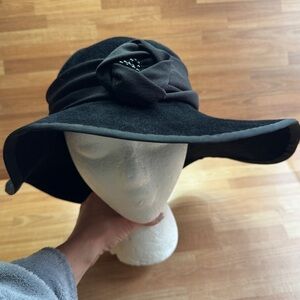 black wool felt cloche hat with a flower accent vintage